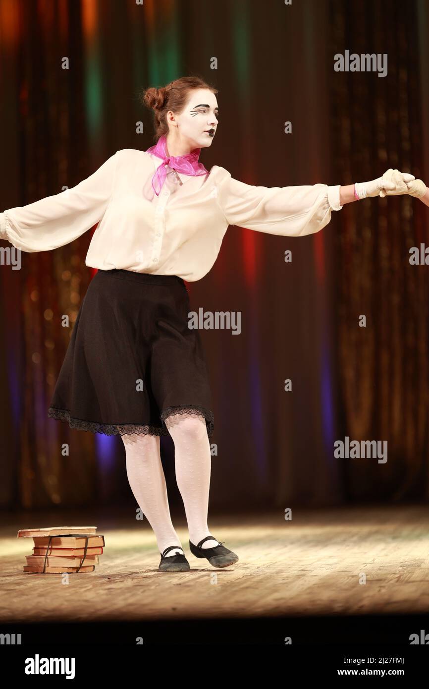 Actress girls clowns show performance on stage Stock Photo - Alamy