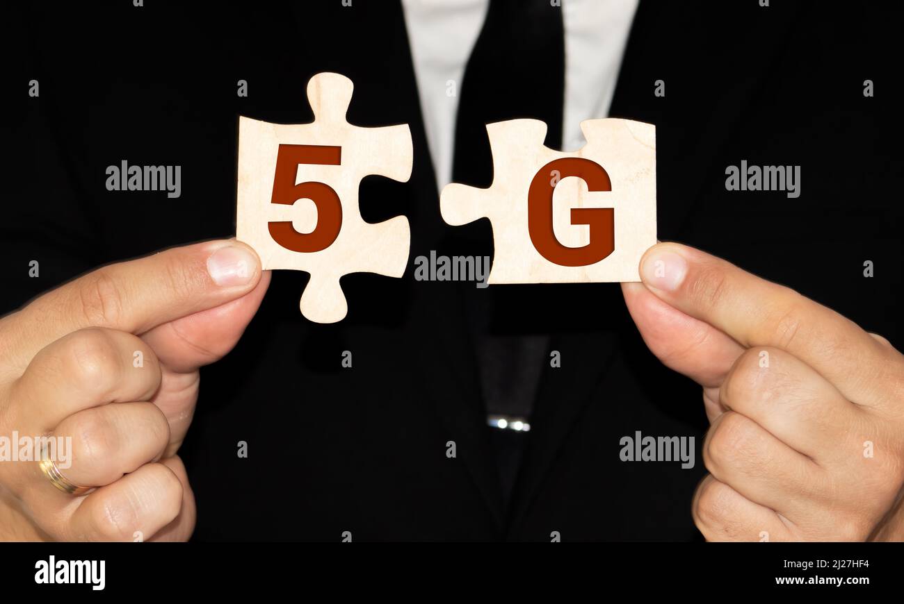 Symbol of the change from 4G to 5G. on puzzle Stock Photo - Alamy