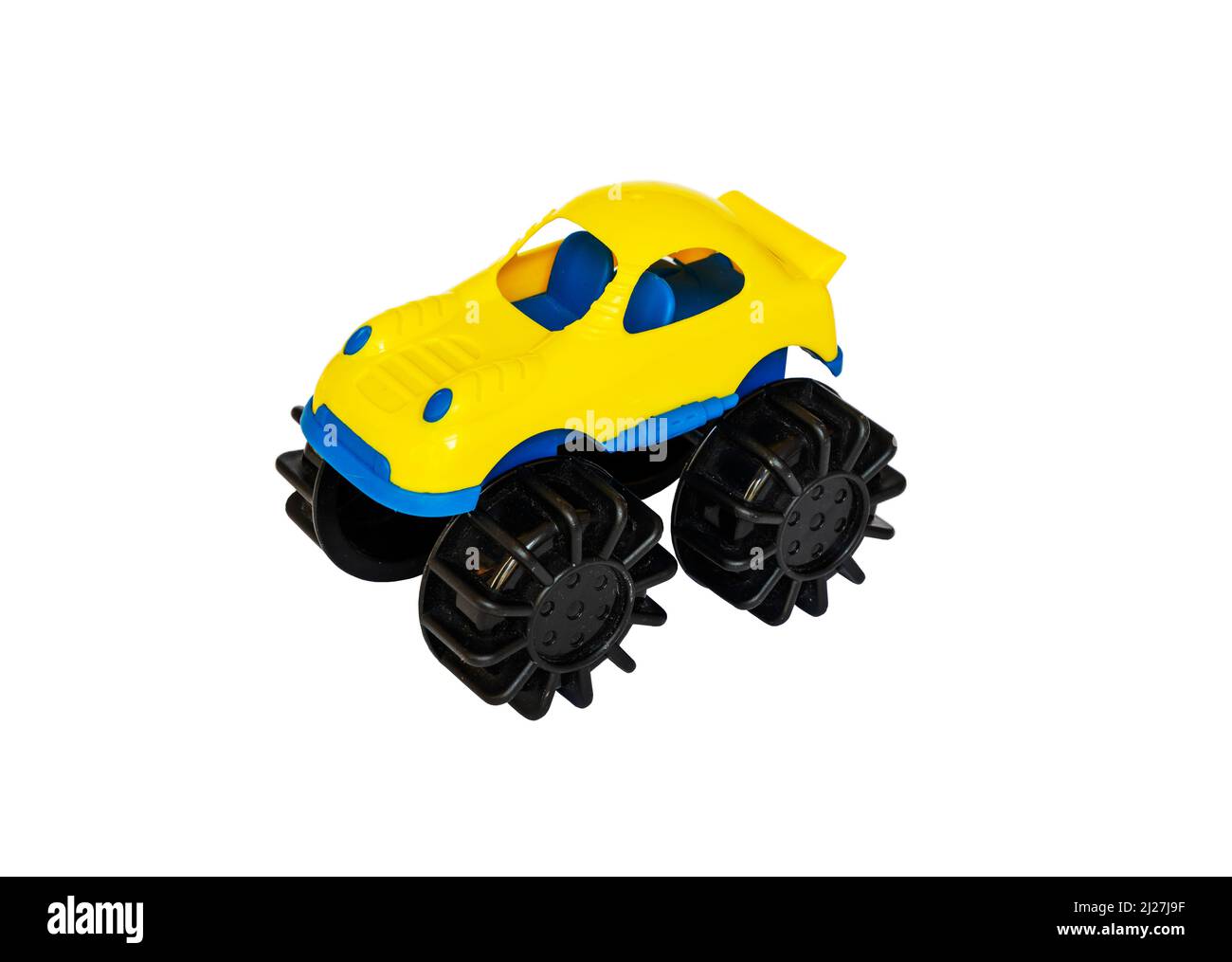 Children's yellow plastic toy car on a white background Stock Photo