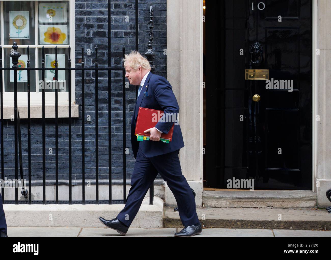 London, UK. 30th Mar, 2022. Prime Minister, Boris Johnson, leaves number 10 Downing Street to go to the Houses of Parliamnet for Prime Ministers Questions. He will face Sir Keir Starmer across the despatch box. Credit: Mark Thomas/Alamy Live News Stock Photo