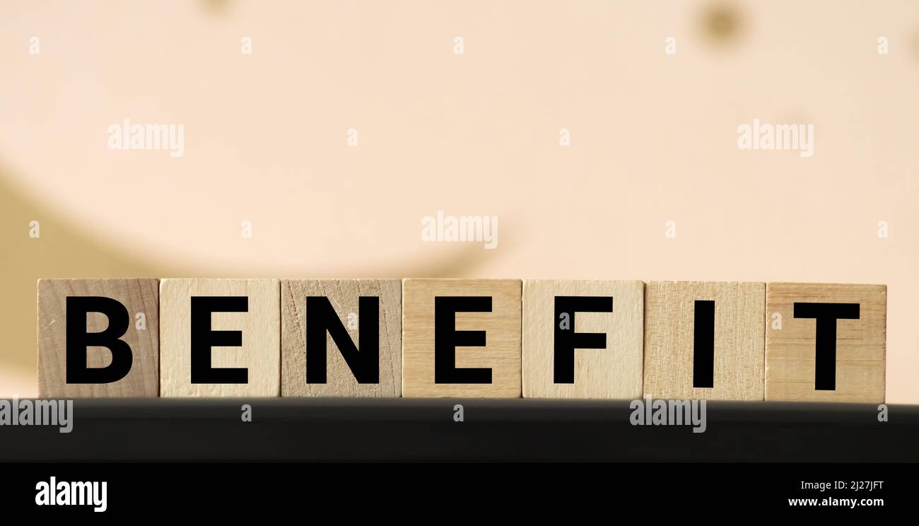 BENEFITS word made with building blocks, concept Stock Photo Alamy