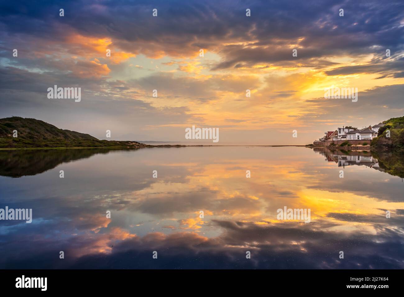 Overcast cloudy sunrise over Mossel bay lagoon. Mossel bay, Western Cape, South Africa Stock Photo