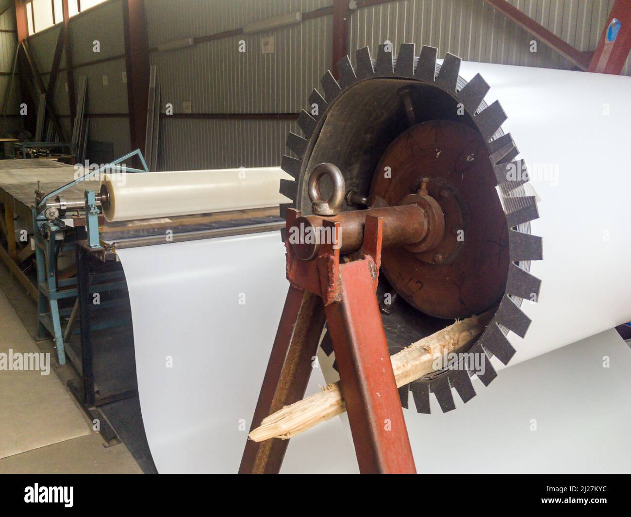 Manual sheet metal coil unwinding machine Stock Photo Alamy
