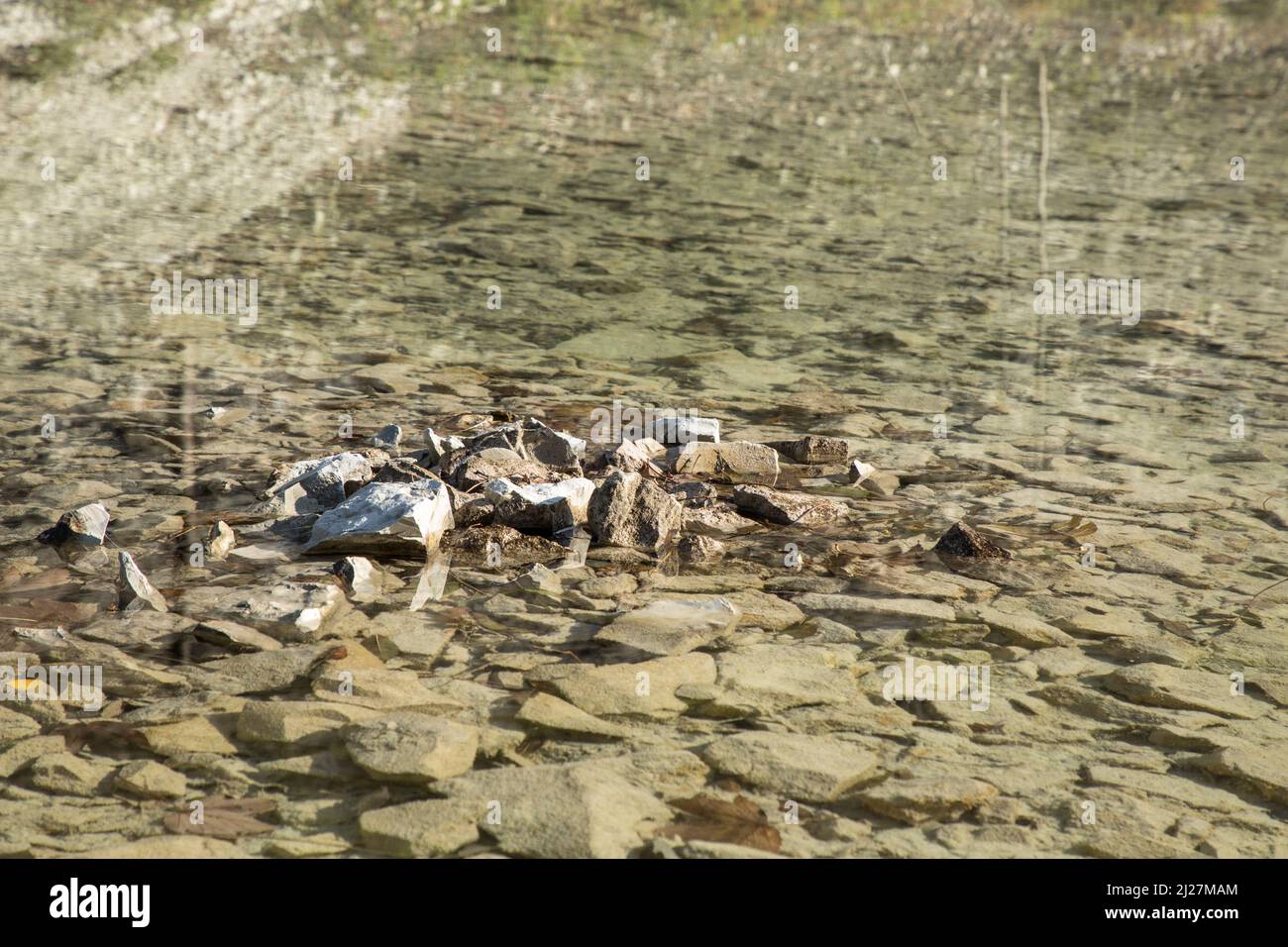 Sea Surface Rocks Transparent sea surface stones hi-res stock photography and images - Alamy