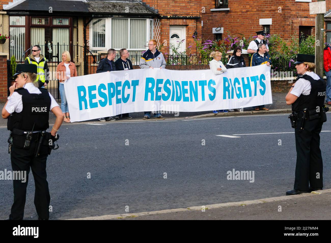 11/08/2012, Belfast, Northern Ireland. Protesters hold up a banner in protest against the Apprentice Boys of Derry parade which passed off peacefully Stock Photo