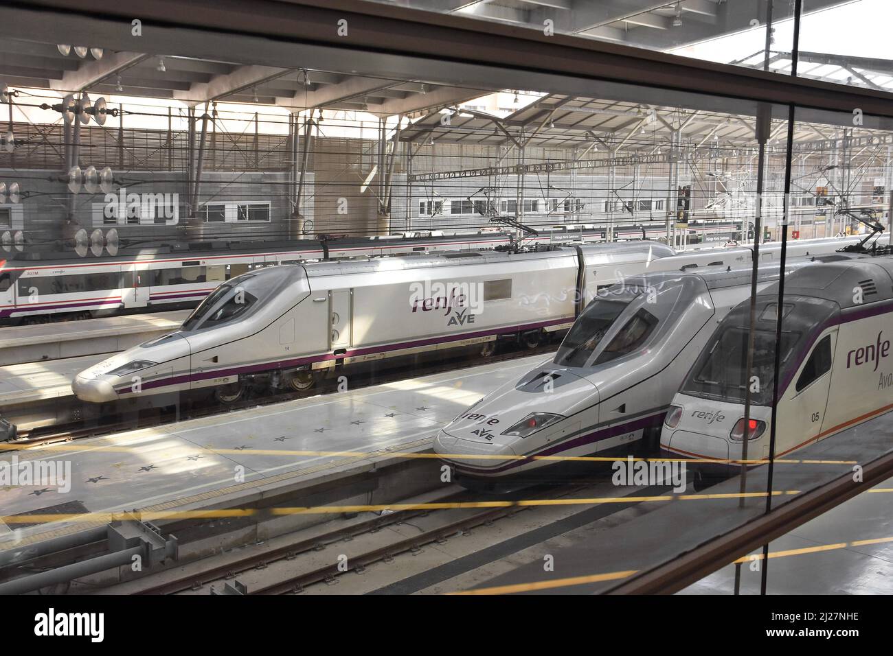 AVE High-speed trains operated by Renfe at Maria Zambrano railway station in Malaga Spain. Stock Photo