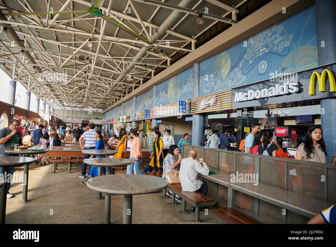 Travellers getting a quick bite along with tea and coffee at the Mumbai