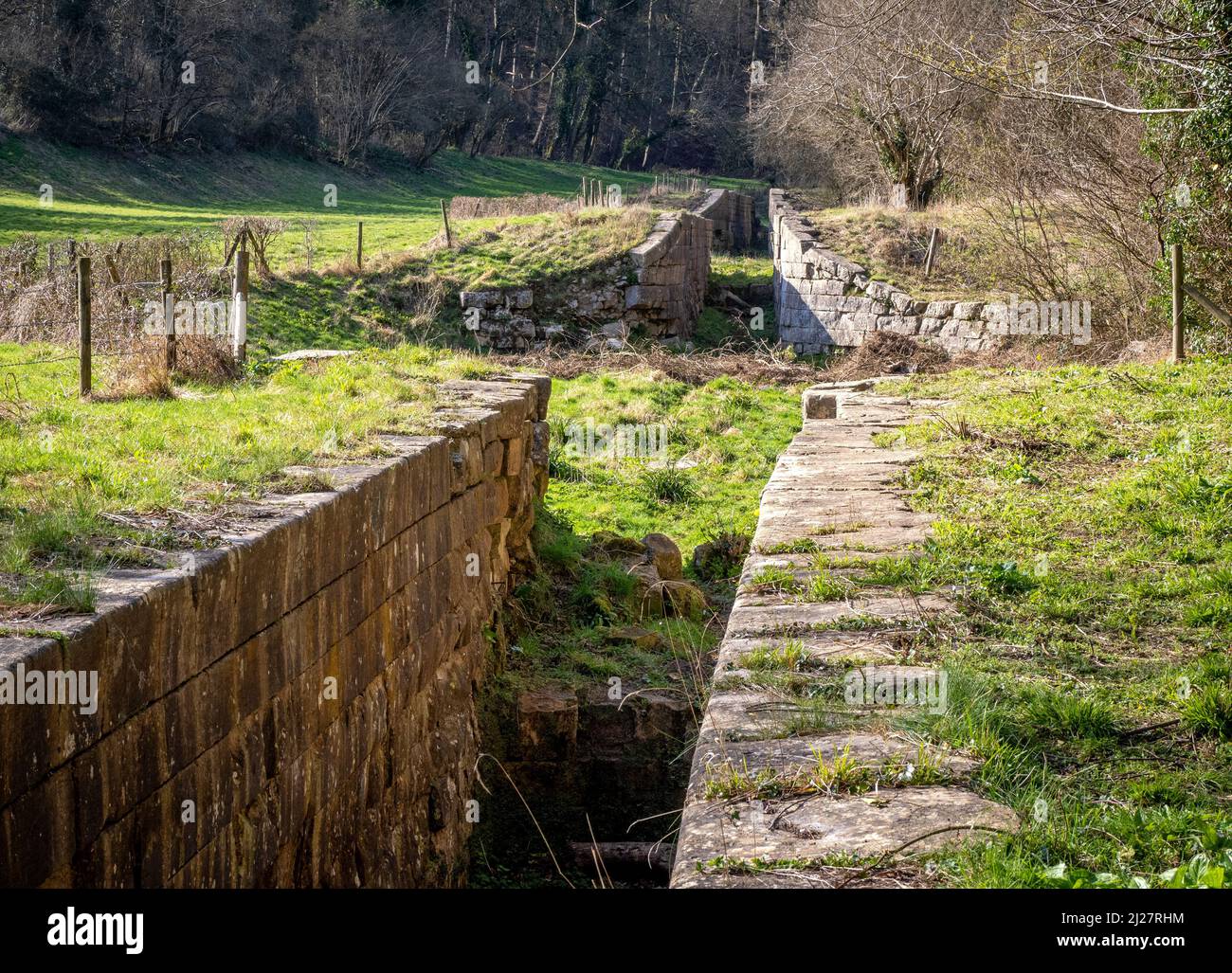 Three of the original 22 locks of the Combe Hay lock flight on the derelict Somersetshire Coal Canal in Somerset UK Stock Photo