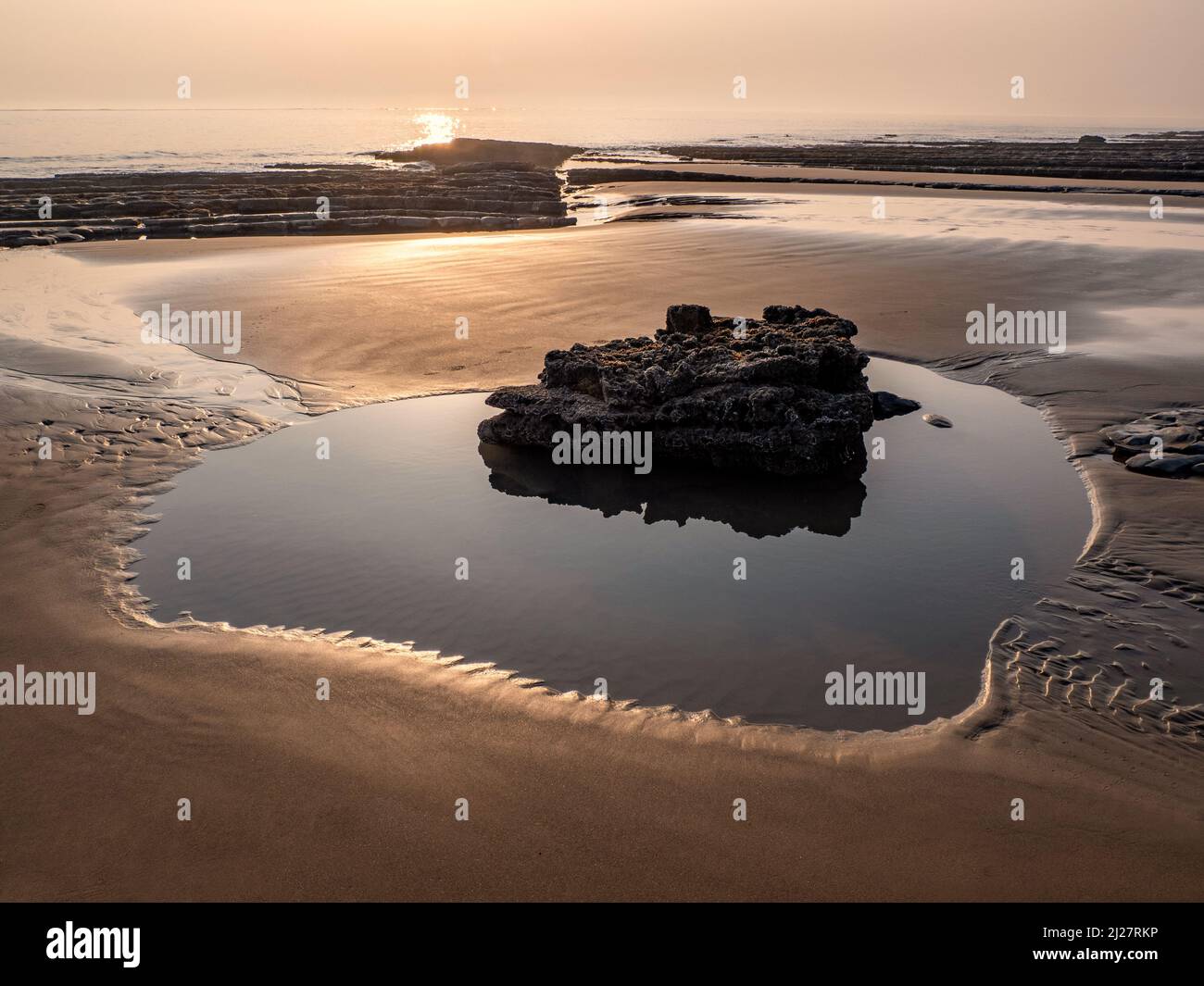 Low tide on the beach near Nash Point on the Glamorgan Heritage Coast in South Wales UK Stock Photo