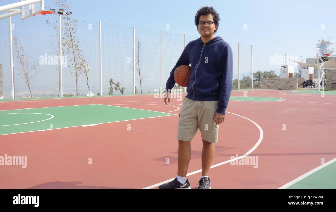 Ready to play basketball. In the court Stock Photo