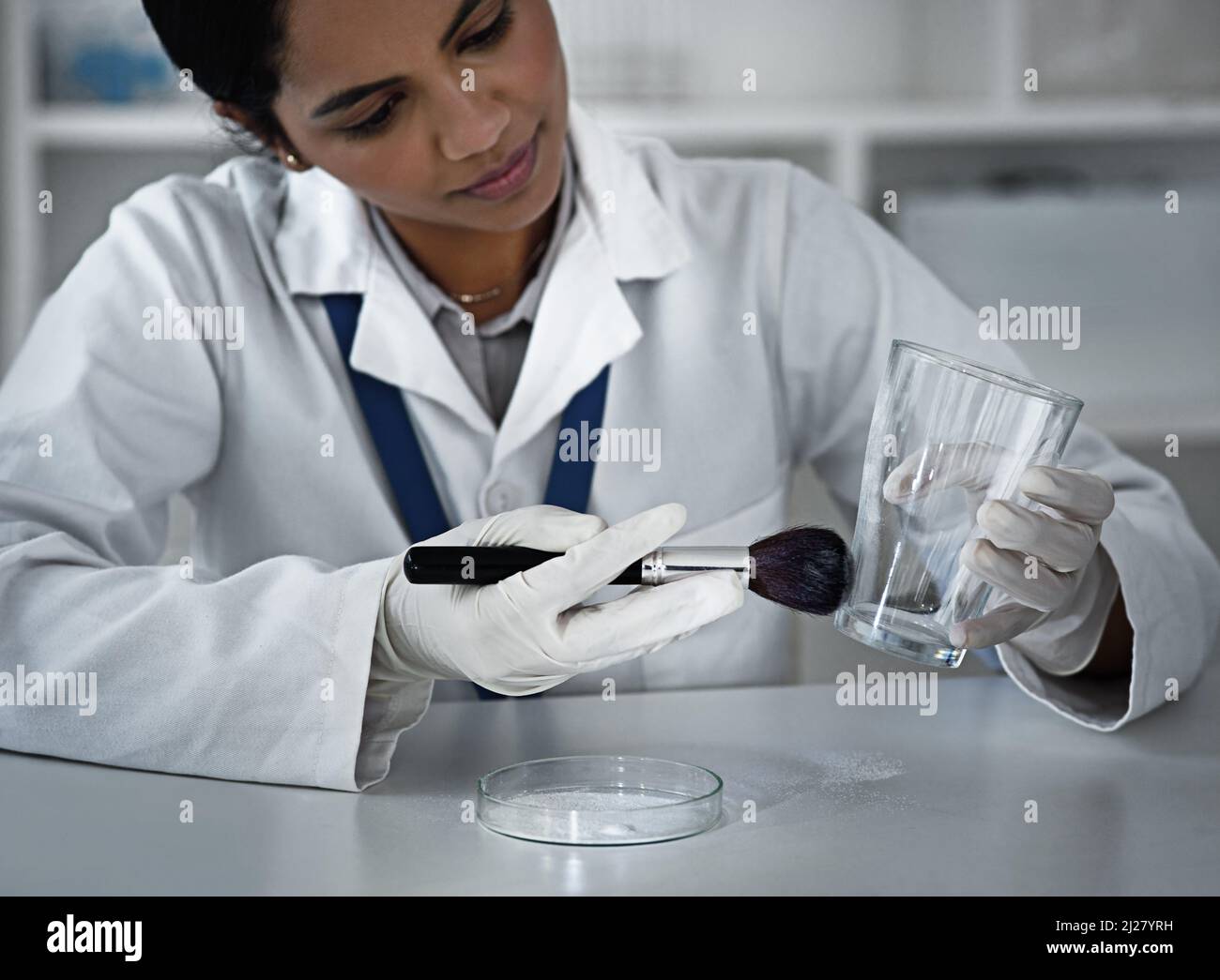 Shes got evidence to uncover. High angle shot of a female forensic ...
