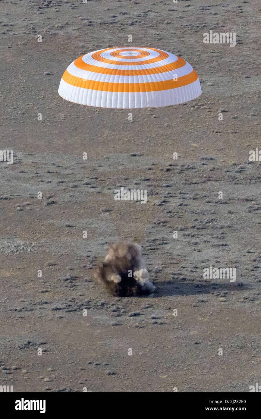 Zhezkazgan, Kazakhstan. 30th Mar, 2022. The Soyuz MS-19 spacecraft is seen as it lands in a remote area near the town of Zhezkazgan, Kazakhstan with Expedition 66 crew members Mark Vande Hei of NASA, and cosmonauts Pyotr Dubrov, and Anton Shkaplerov of Roscosmos, on Wednesday, March 30, 2022. Vande Hei and Dubrov are returning to Earth after logging 355 days in space as members of Expeditions 64-66 aboard the International Space Station. Credit: UPI/Alamy Live News Stock Photo