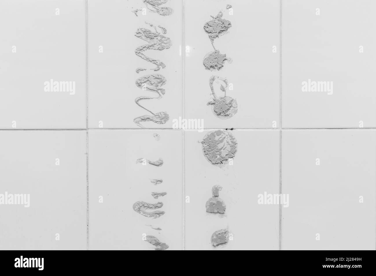 Cement stains on white spots wall tiles or floor old texture concrete