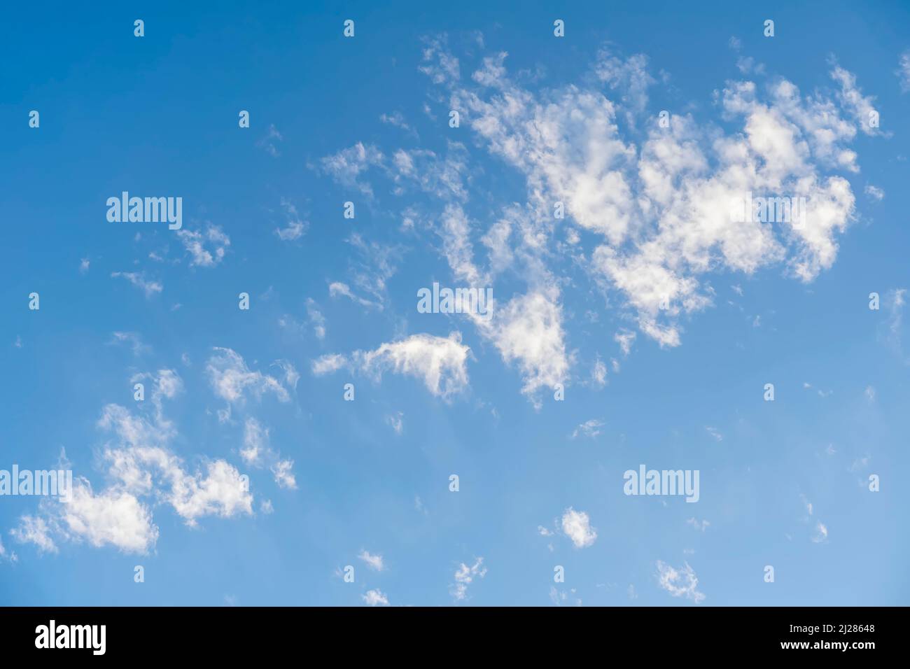 Blue sky with soft fluffy white clouds in summer day, background Stock ...