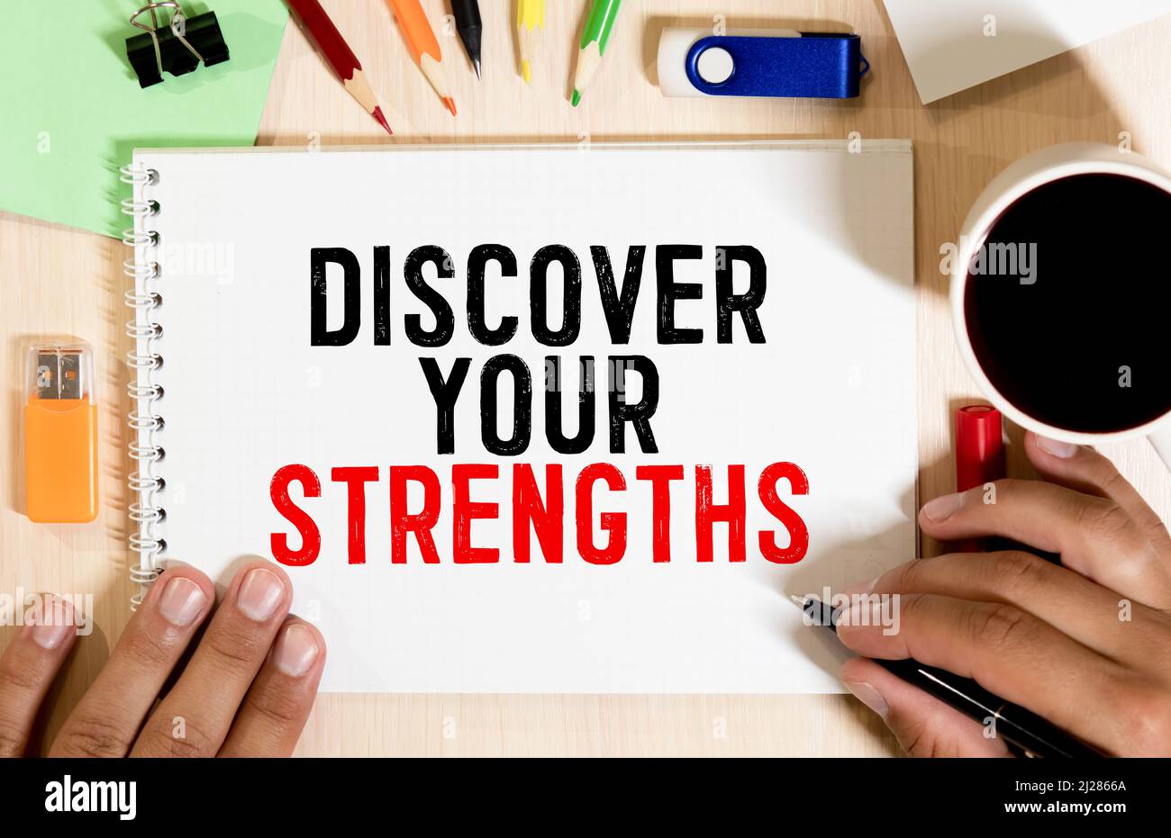 Discover your strengths- business concept of entrepreneur management message on wood background with paper clips. Stock Photo