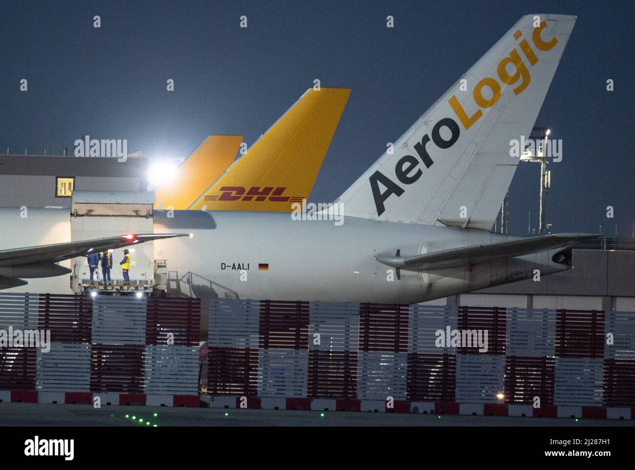 26 March 2022, Hessen, Frankfurt/Main: Cargo planes are unloaded at Frankfurt Airport. Photo: Boris Roessler/dpa Stock Photo