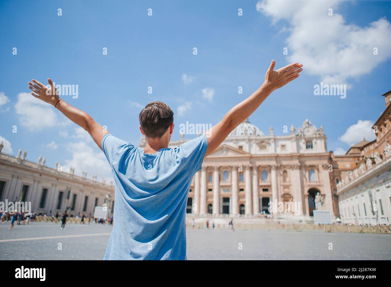 Happy man at St. Peter's Basilica church in Vatican, Rome. The St ...