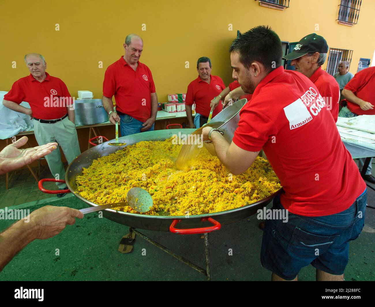 Preparation of a giant paella during the traditional fair in Fuengirola