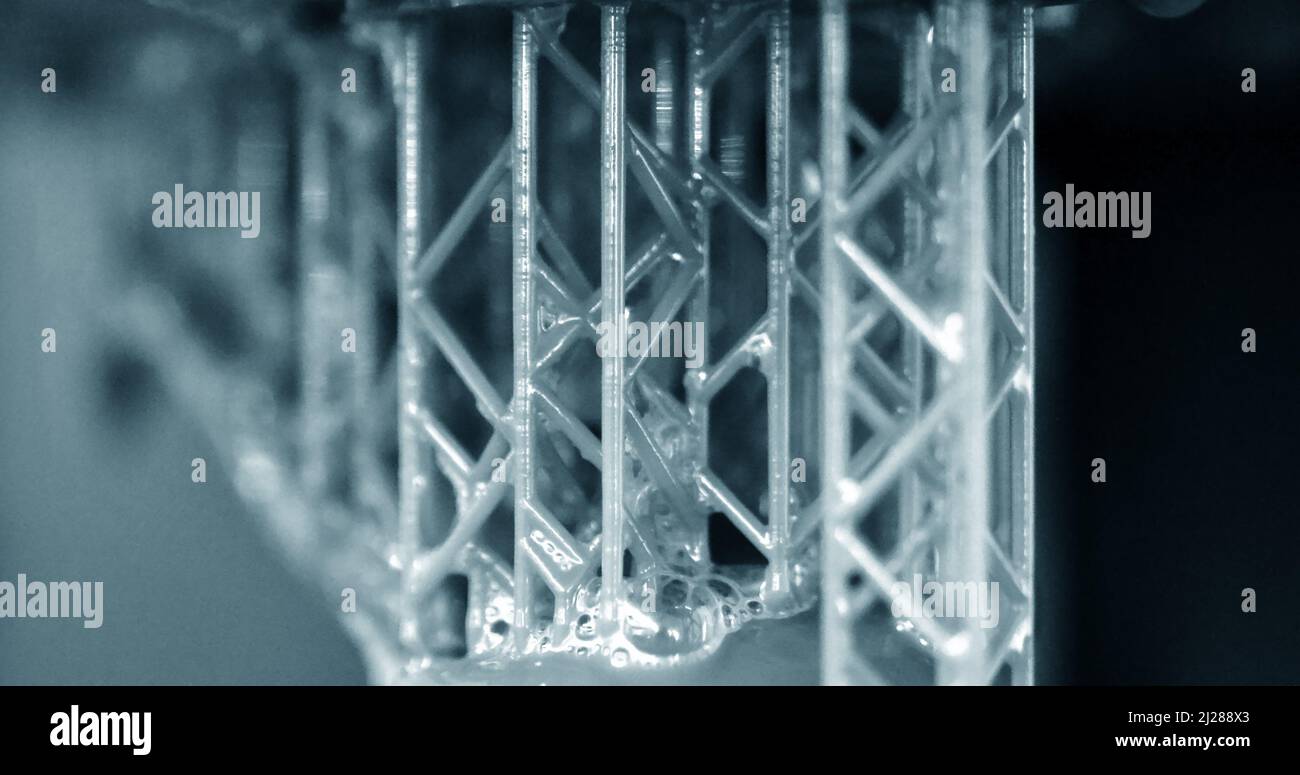 Stereolithography DPL 3d printer create detail and liquid drips, Stock Photo