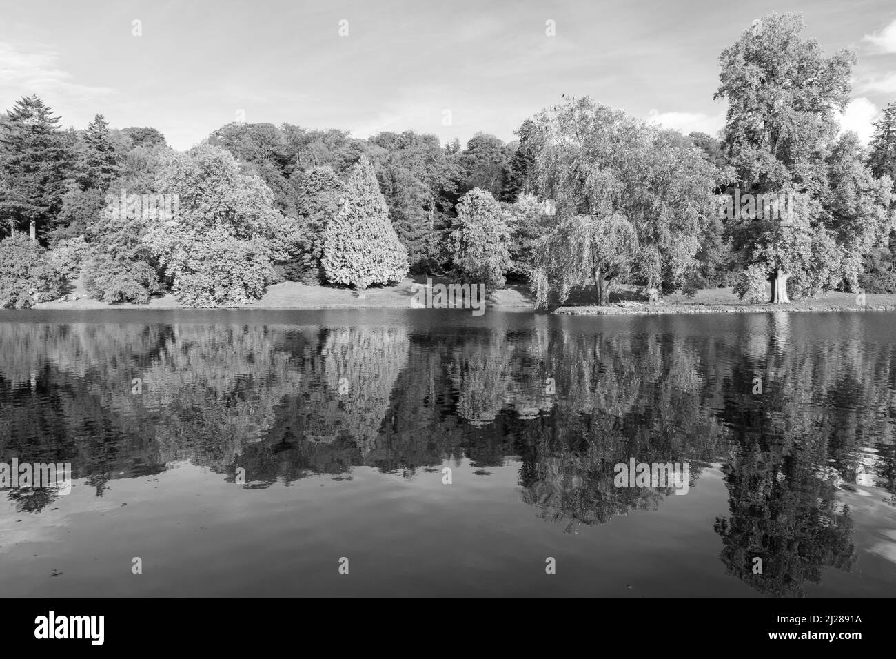 Black and white photo of the lake at Stourhead house and gardens in Wiltshire Stock Photo