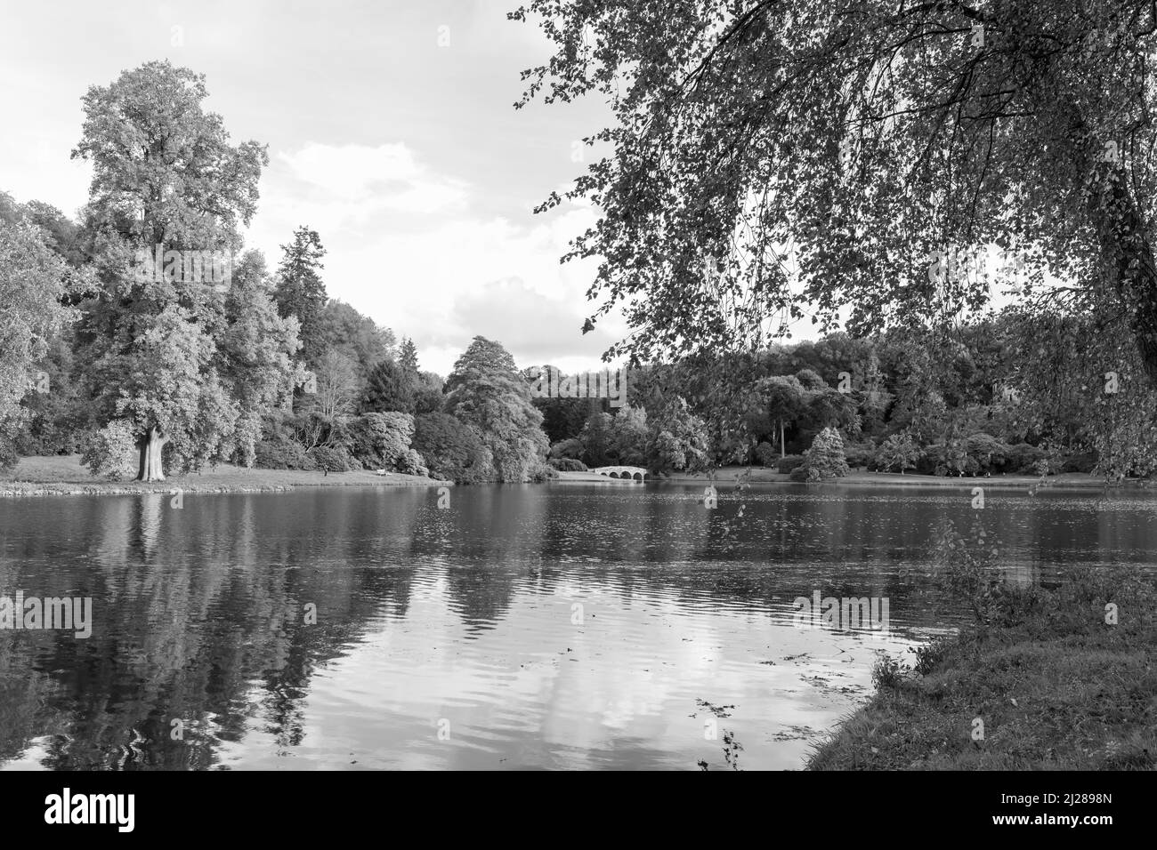 Black and white photo of the lake at Stourhead house and gardens in Wiltshire Stock Photo