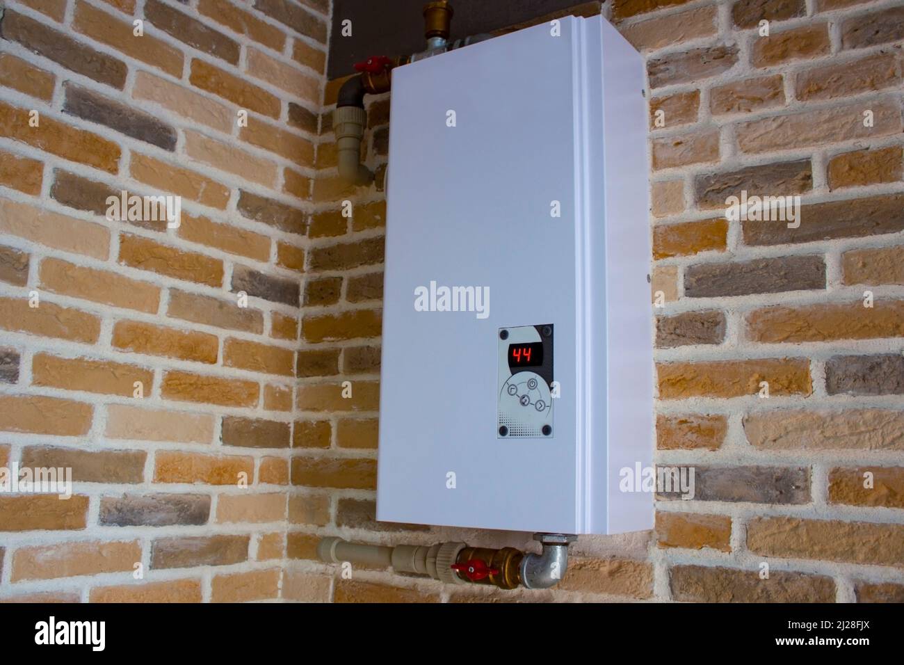 Water heating system with temperature control. Electric boiler with