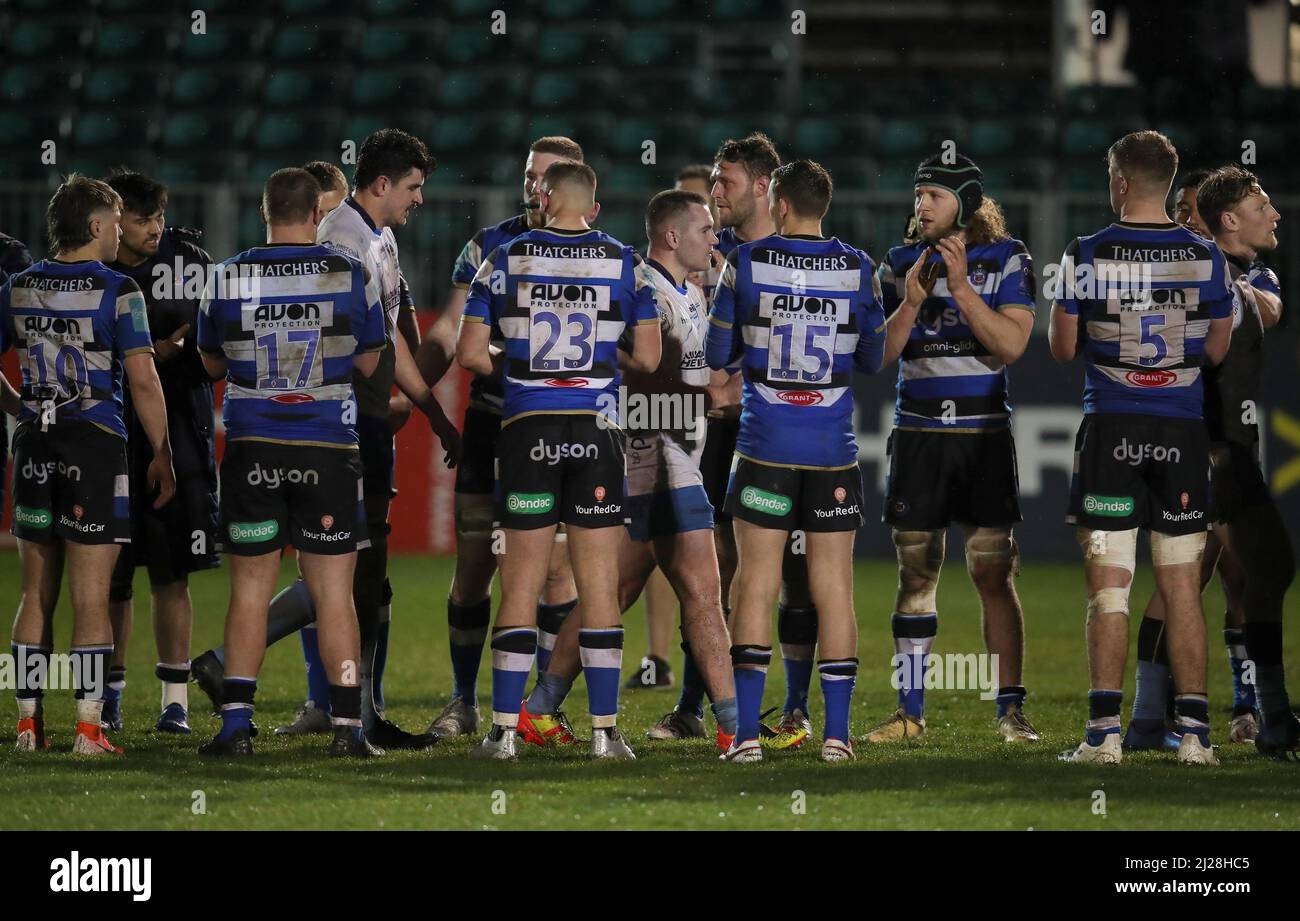 Bath Rugby players congratulate the Worcester Warriors players after