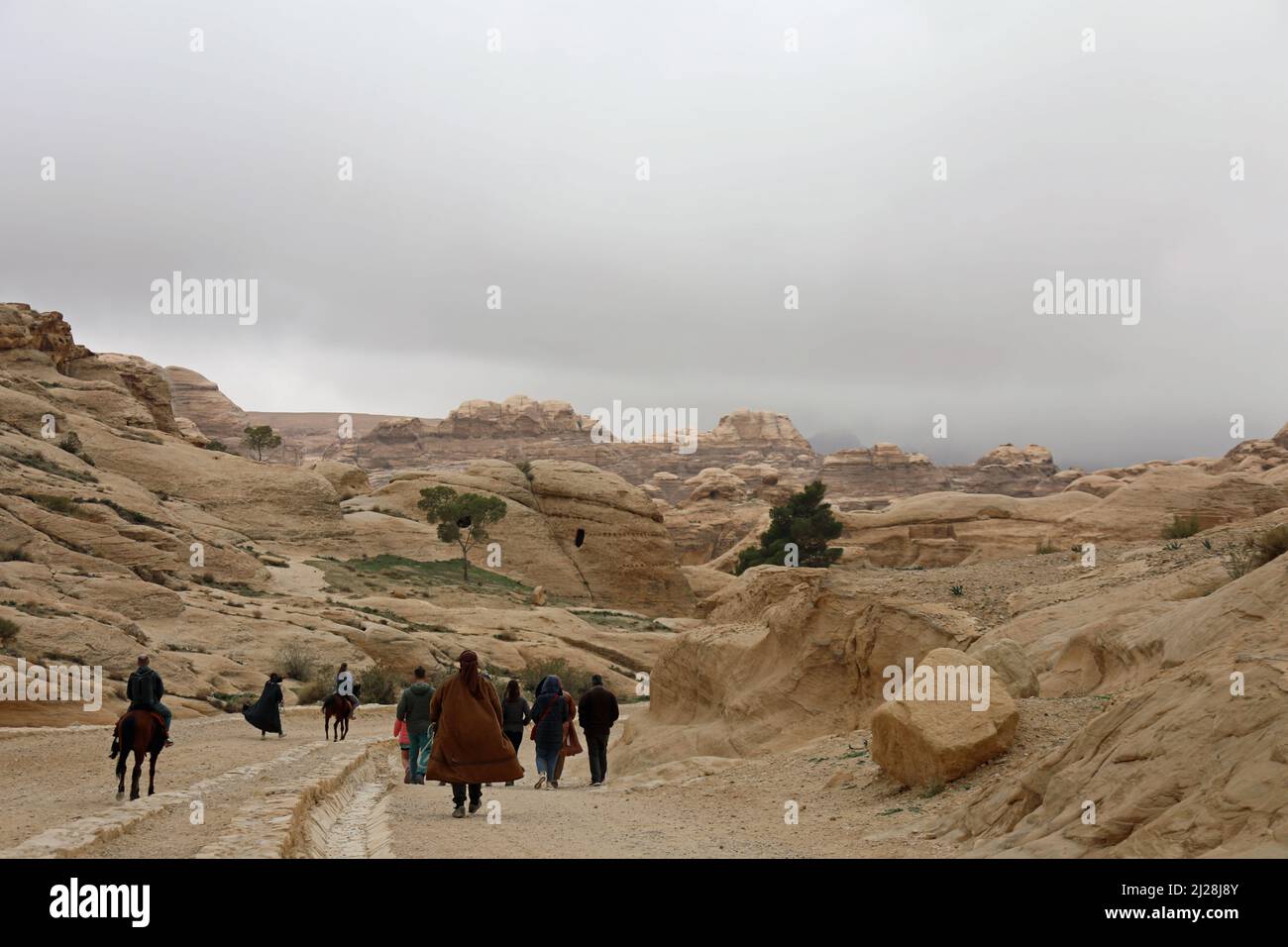 Early morning tourists at Petra Stock Photo