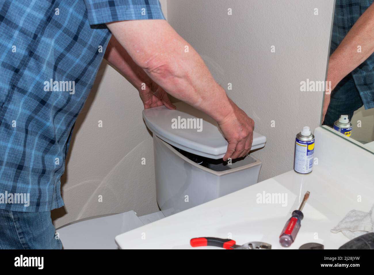 Installing a new toilet, privy or latrine Stock Photo Alamy
