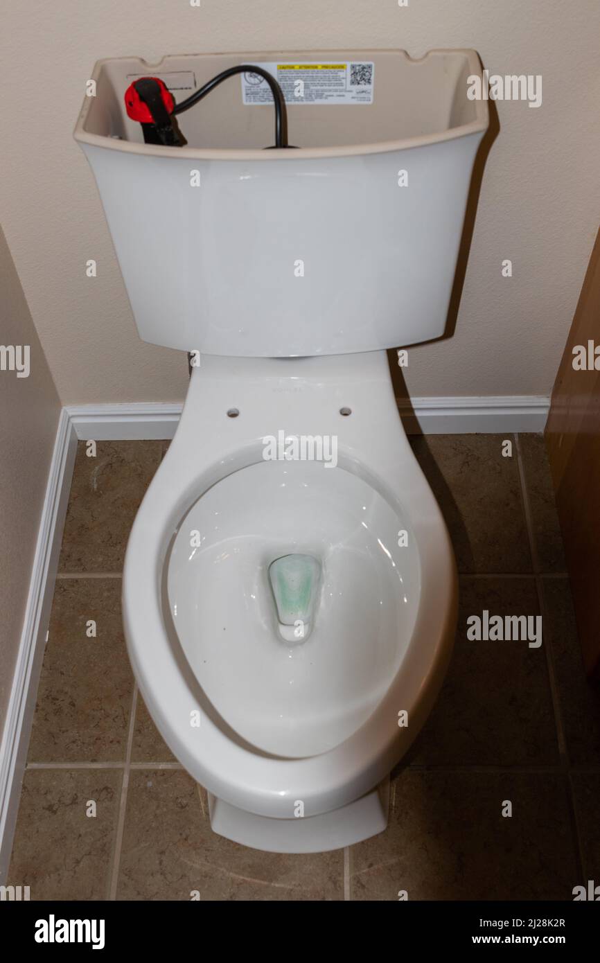 Installing a new toilet, privy or latrine Stock Photo Alamy