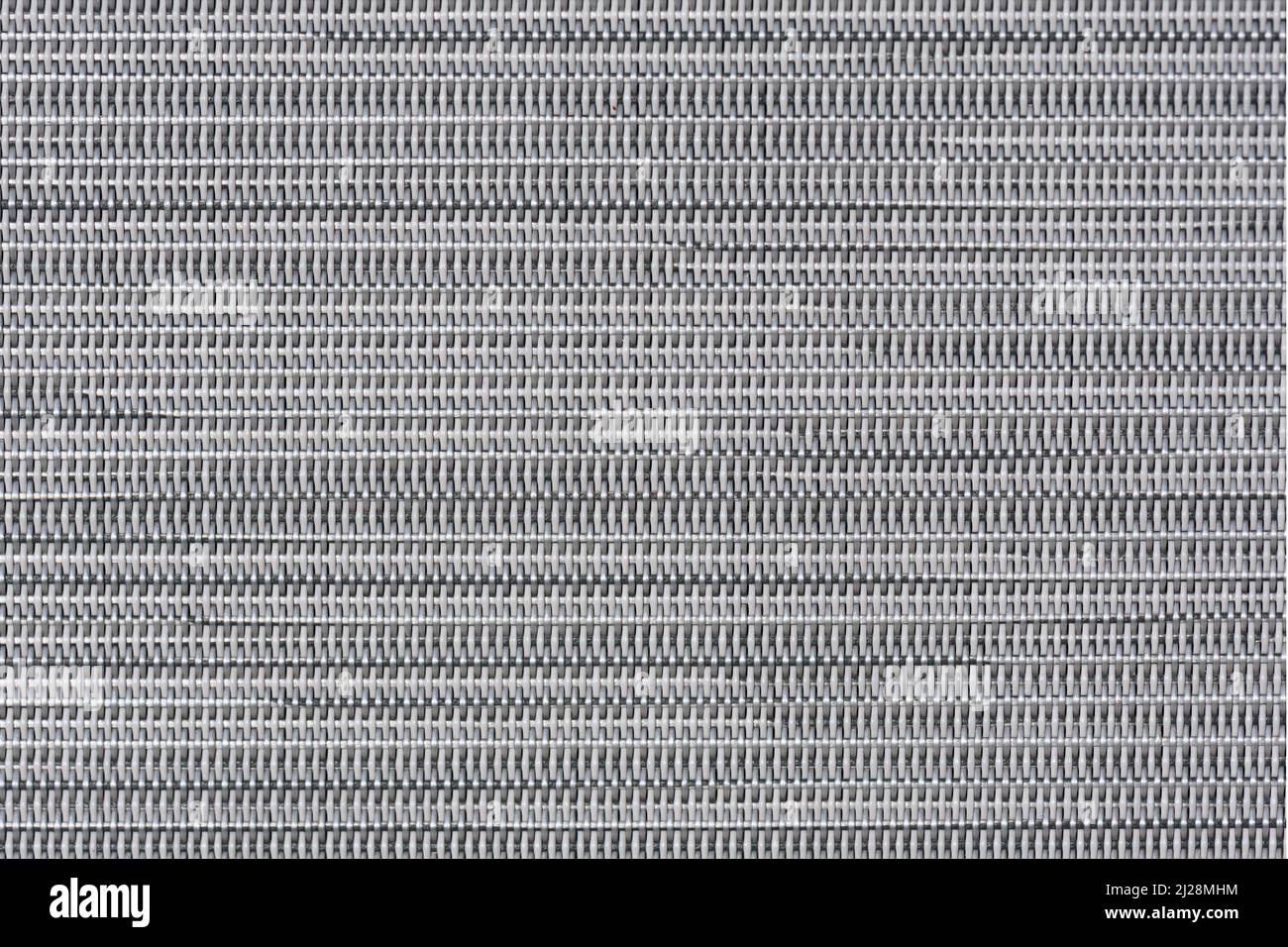 Grey patterns background from canvas of a chair. Stock Photo