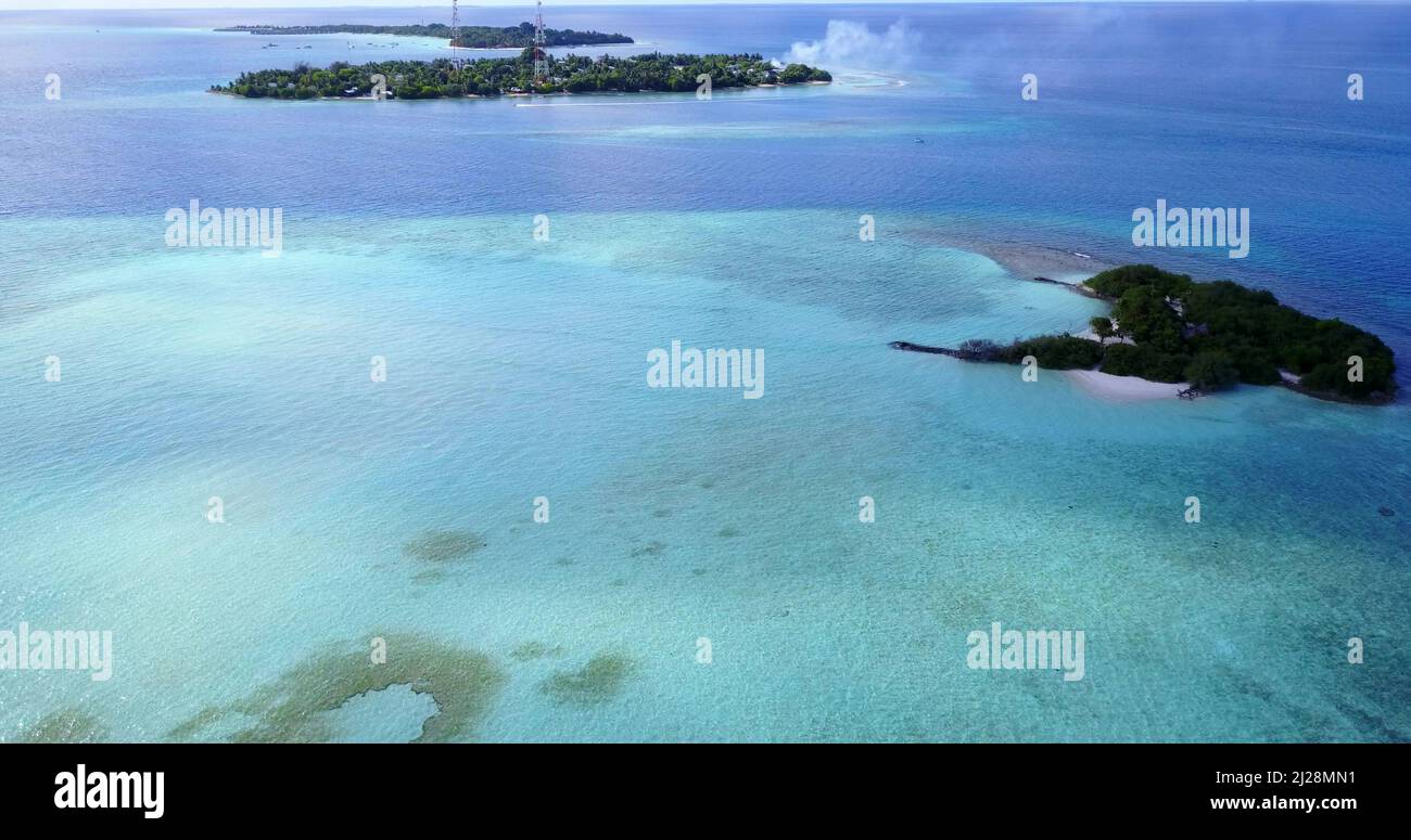 An aerial view of an ocean with islands Stock Photo