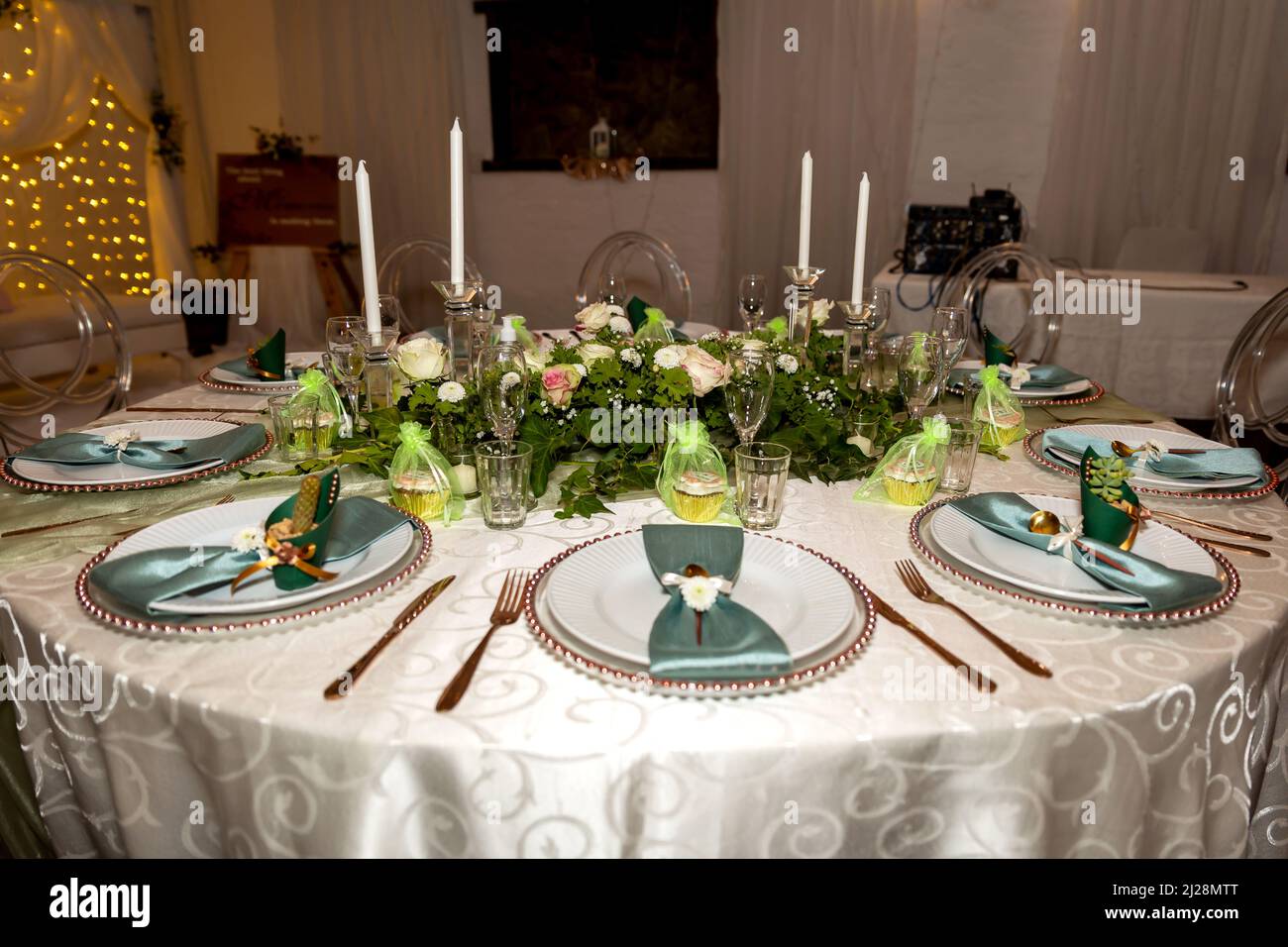 Green and Gold Theme Table setting and decorations Stock Photo - Alamy
