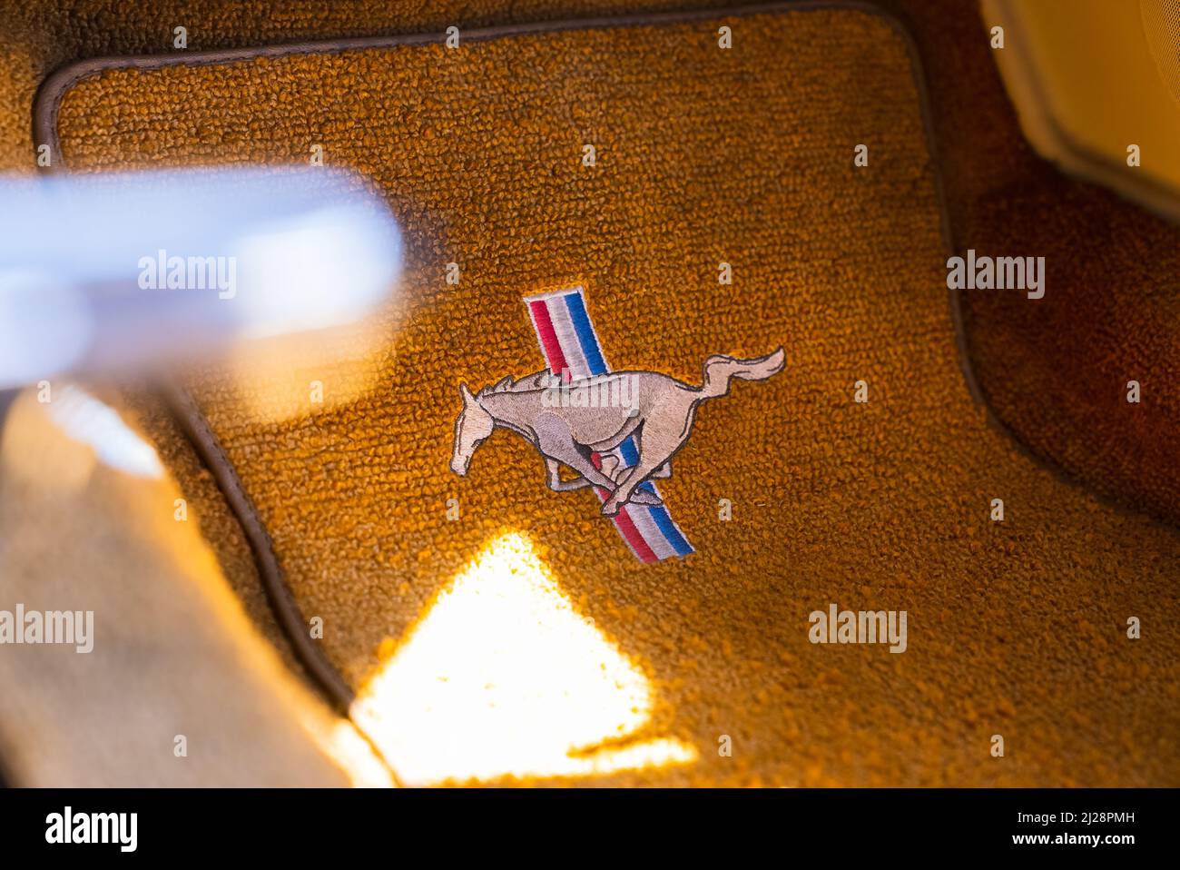 A car floor mat inside red 1966 Ford Mustang, Broward, USA Stock Photo