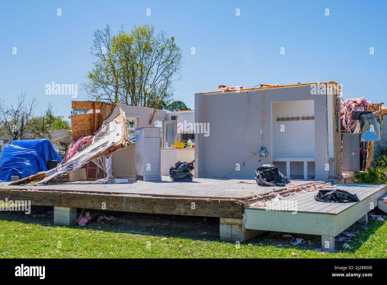 ARABI, LA, USA MARCH 26, 2022 Remnants of house ripped apart by
