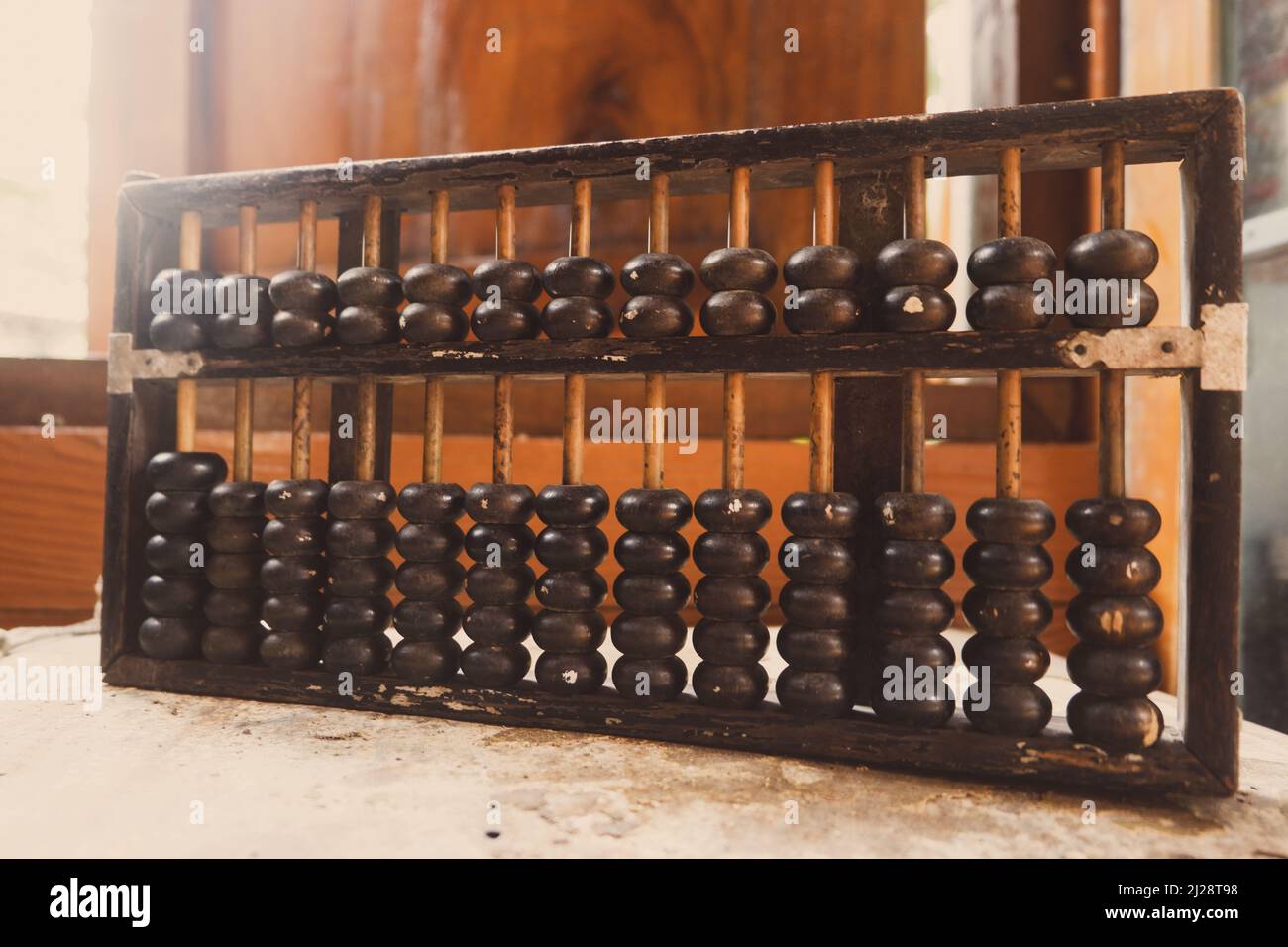 Calculate on abacus hi-res stock photography and images - Alamy