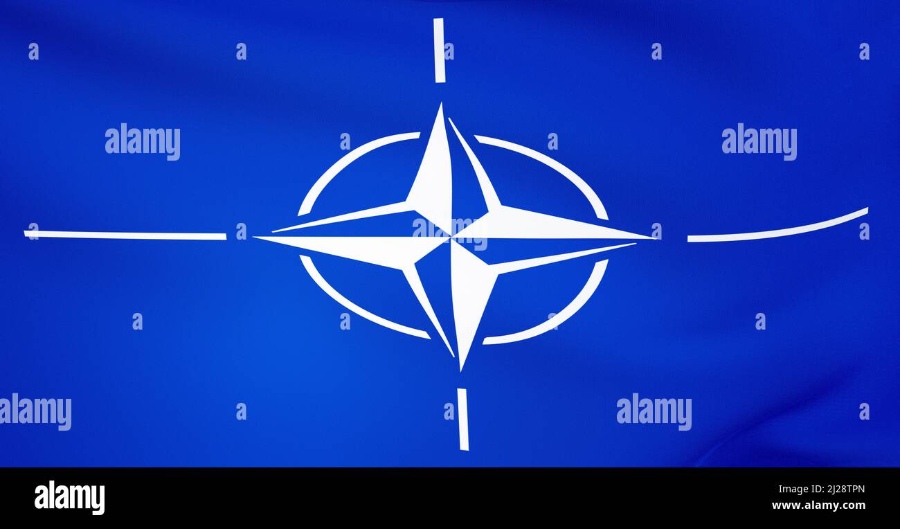 NATO military alliance symbol official flag in the wind, North Atlantic