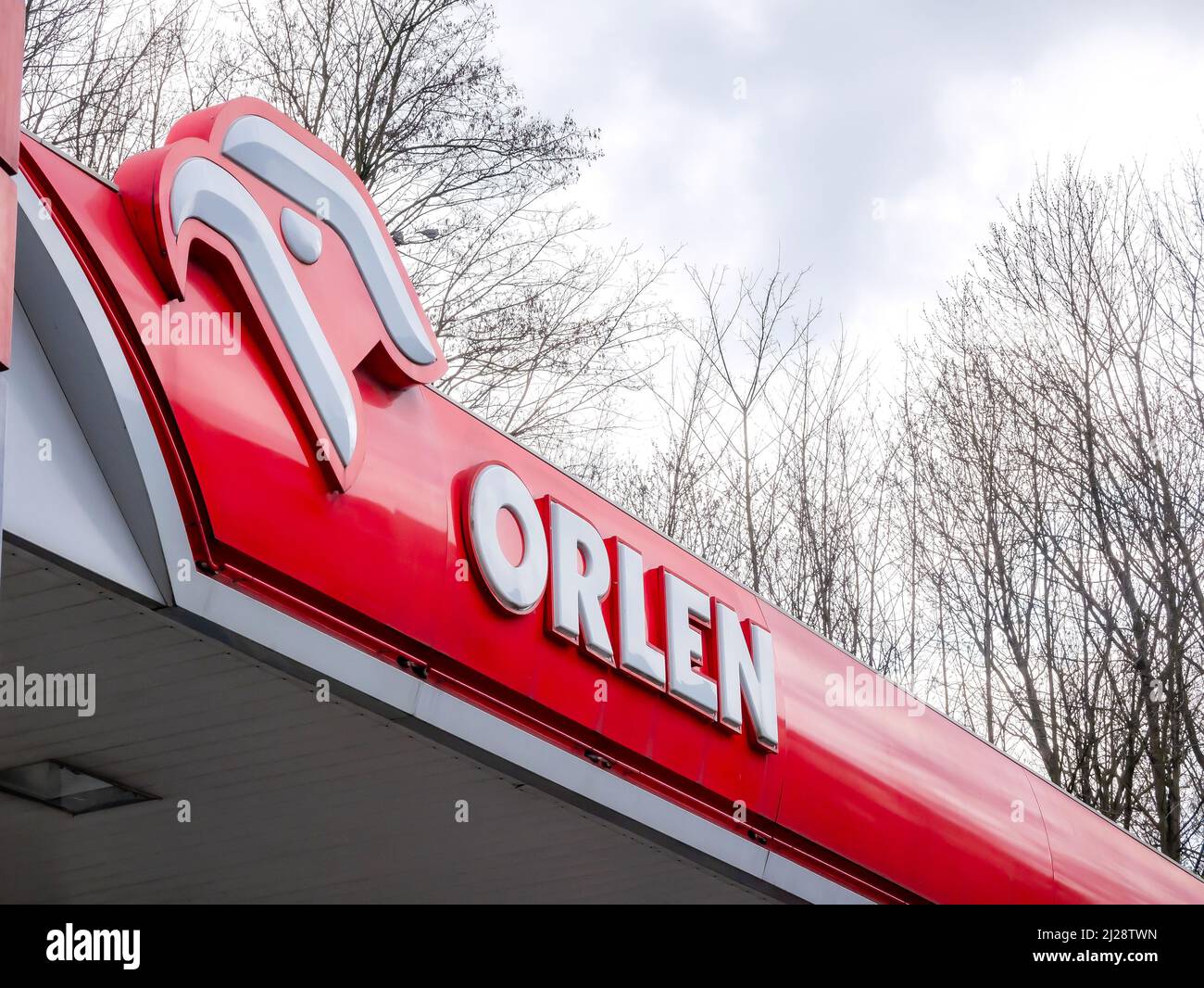 Orlen Polish gas station comapny, brand signage outdoors, logo sign closeup detail, nobody Oil refiner, petrol retailer corporation Stock Photo