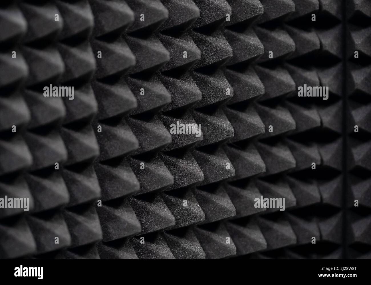 Sound insulation, audio isolation acoustic foam panel, wall tiles, recording studio room soundproofing equipment accessories, object detail, closeup Stock Photo