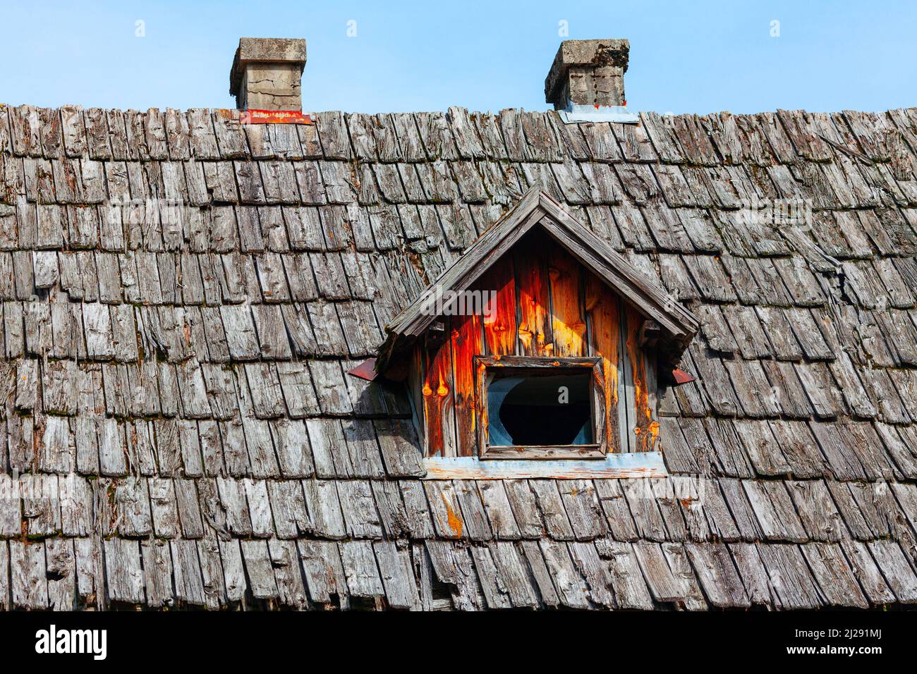 Old roof with attic . Wooden tiled rooftop of old house Stock Photo - Alamy