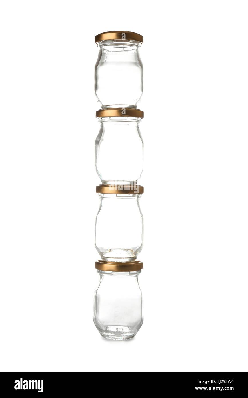 Stack of glass jars on white background Stock Photo Alamy
