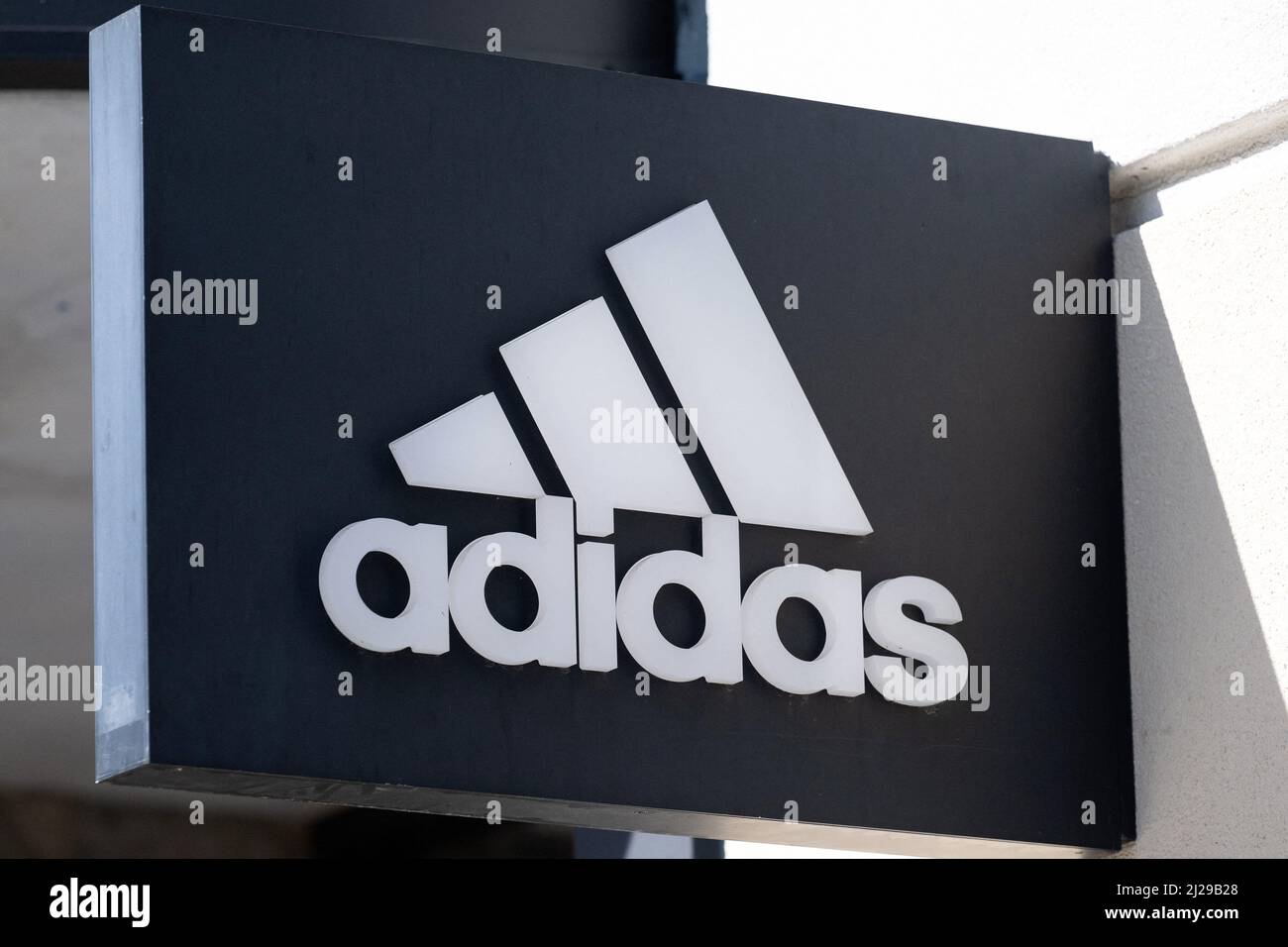 A shop sign of Adidas, on March 28 2022 in Los Angeles CA, USA. Photo ...