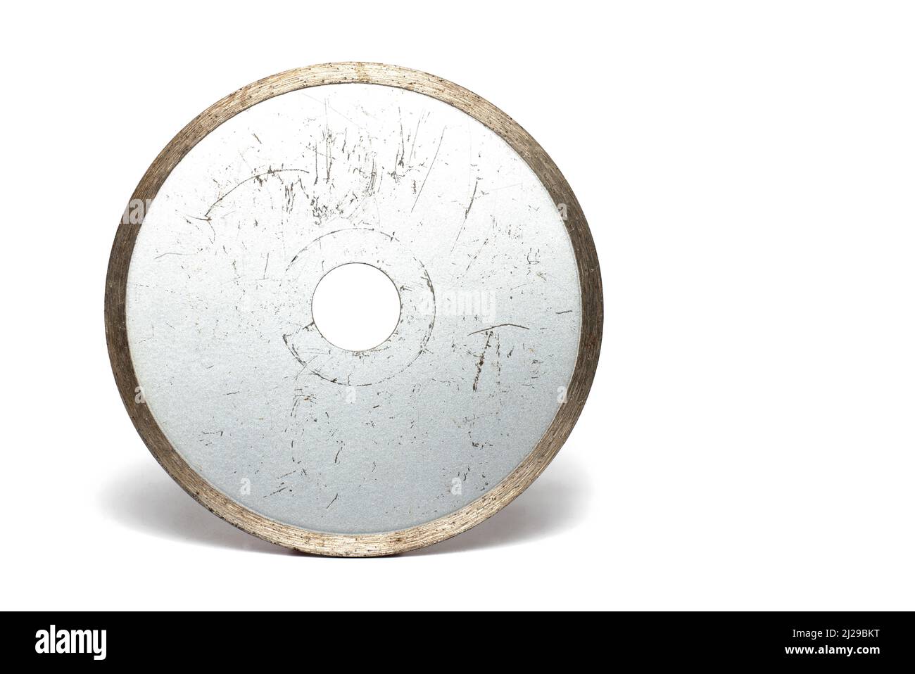 heavily used metal silver shiny special carbide cutting disc close up