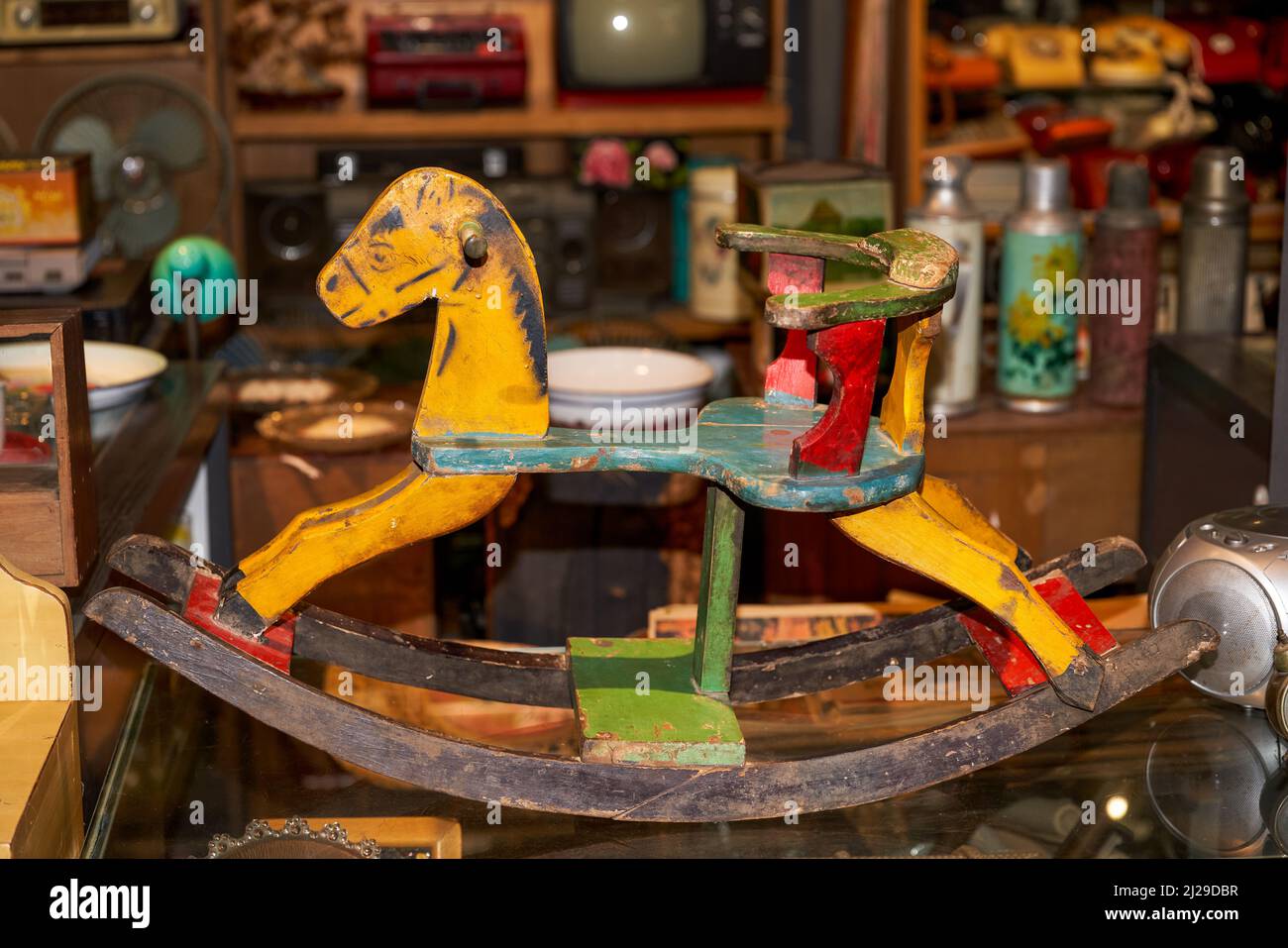 An old children's wooden horse toy in a thrift store Stock Photo Alamy