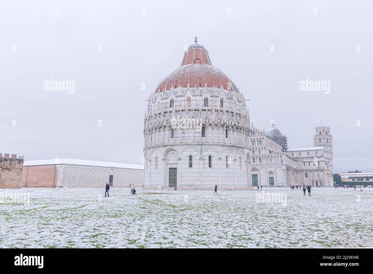Baptistery, Cathedral and Leaning Tower in a snowy day, Pisa, Tuscany, Italy, Europe Stock Photo