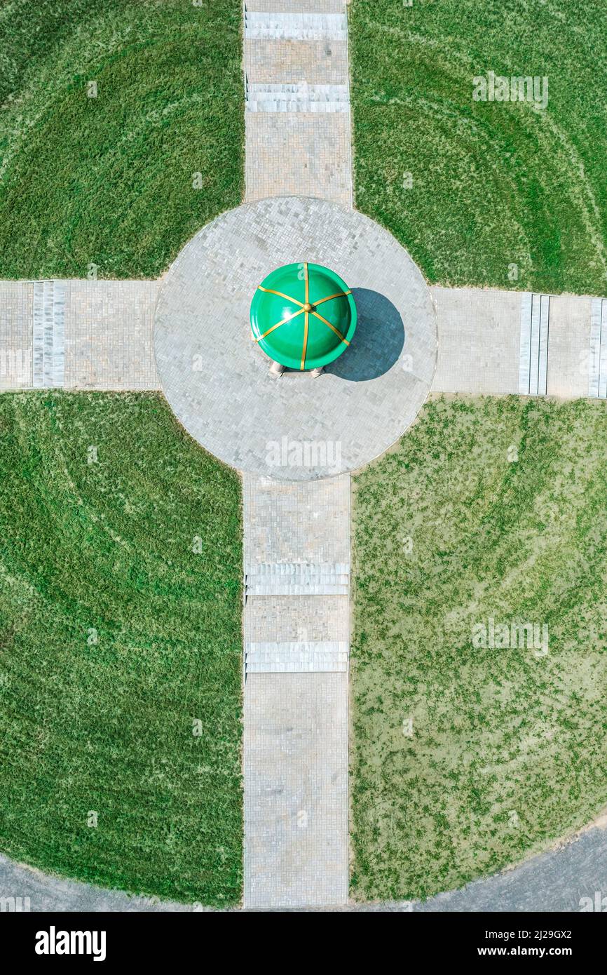 summer park scenery with walking paths and gazebo. aerial top down view. Stock Photo