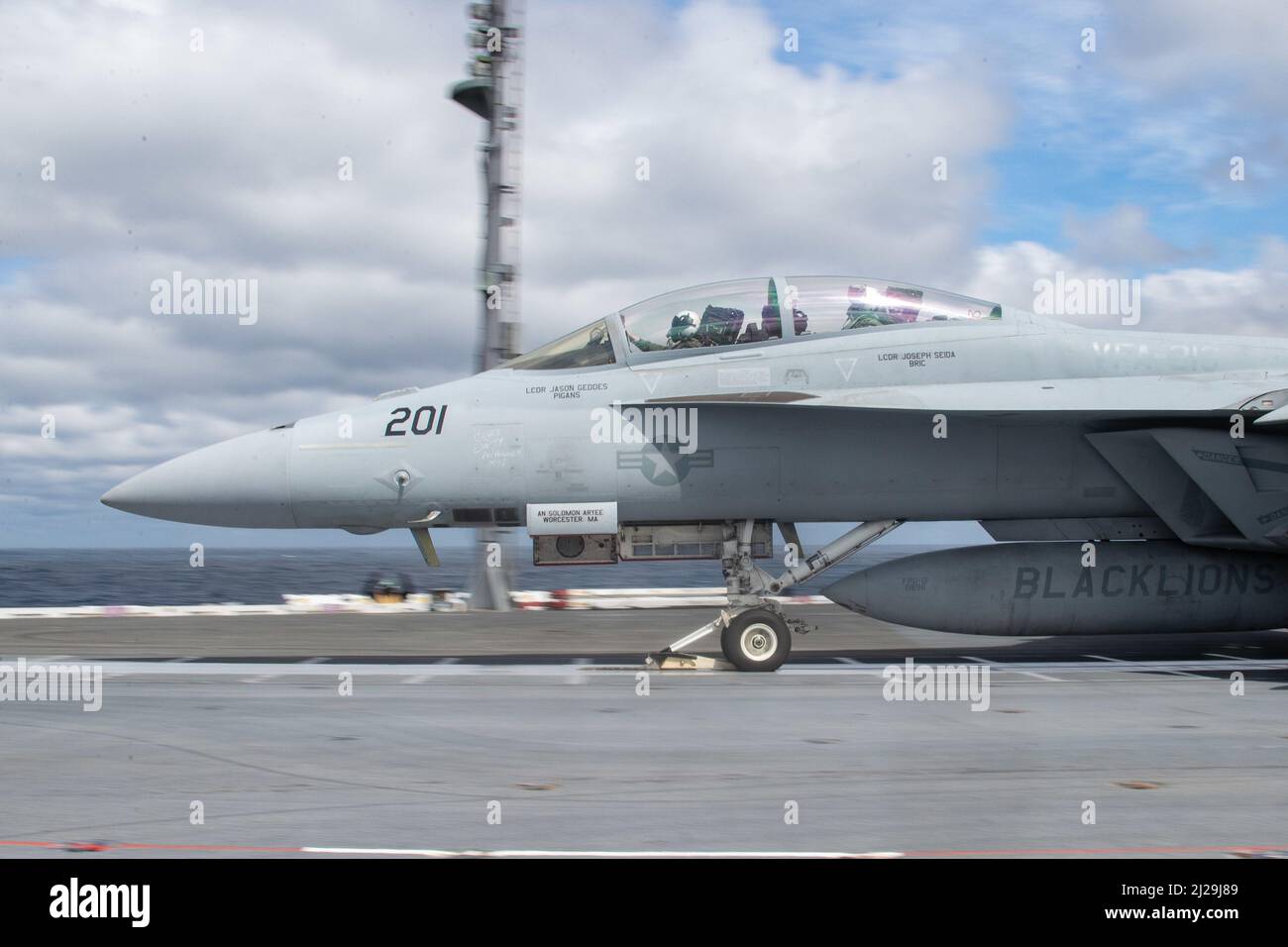An F/A-18F Super Hornet, attached to the 'Blacklions' of Strike Fighter Squadron (VFA) 213, takes off from USS Gerald R. Ford’s (CVN 78) flight deck, March 29, 2022. Ford is underway in the Atlantic Ocean conducting flight deck certification and air wing carrier qualification as part of the ship’s tailored basic phase prior to operational deployment. (U.S. Navy photo by Mass Communication Specialist 2nd Class Zachary Melvin) Stock Photo