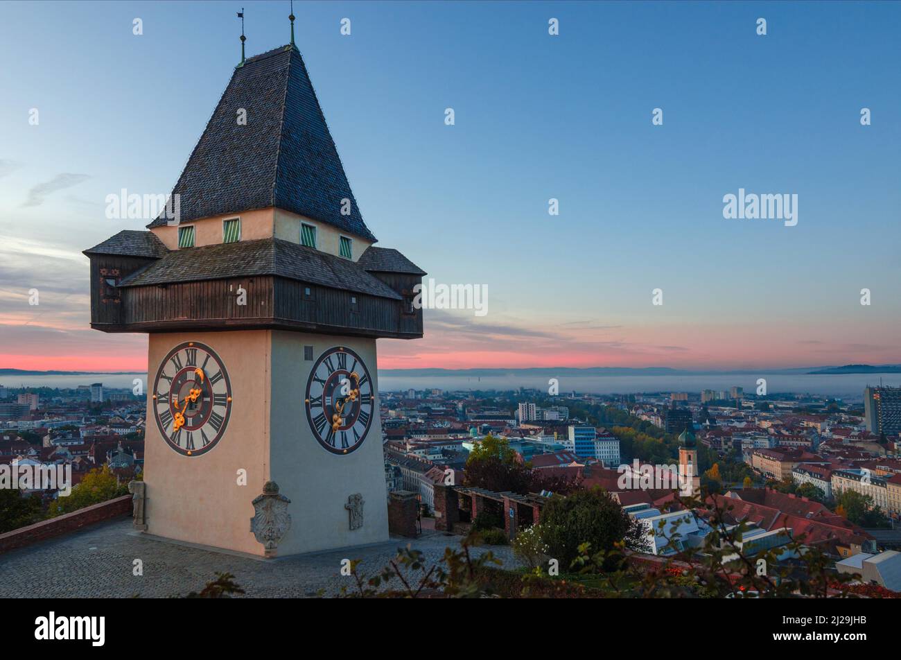 Cityscape of Graz and the famous clock tower (Grazer Uhrturm) on ...