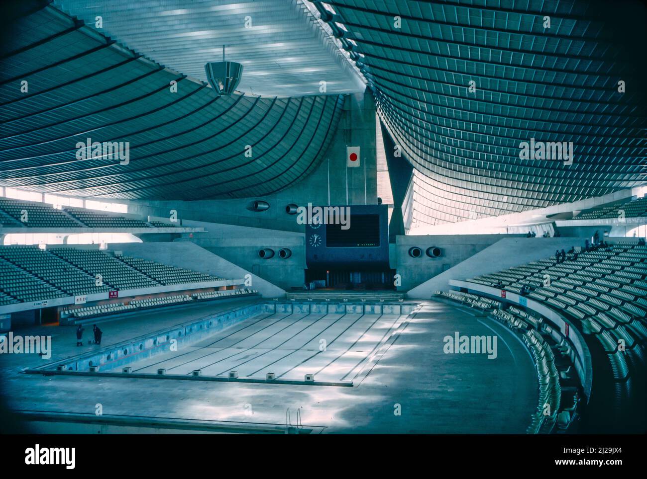 Yoyogi National Stadium is an indoor arena at Yoyogi Park in Shibuya, Tokyo, famous for its suspension roof design. It was designed by Kenzo Tange and built to house aquatic events in the 1964 Summer Olympics. Stock Photo