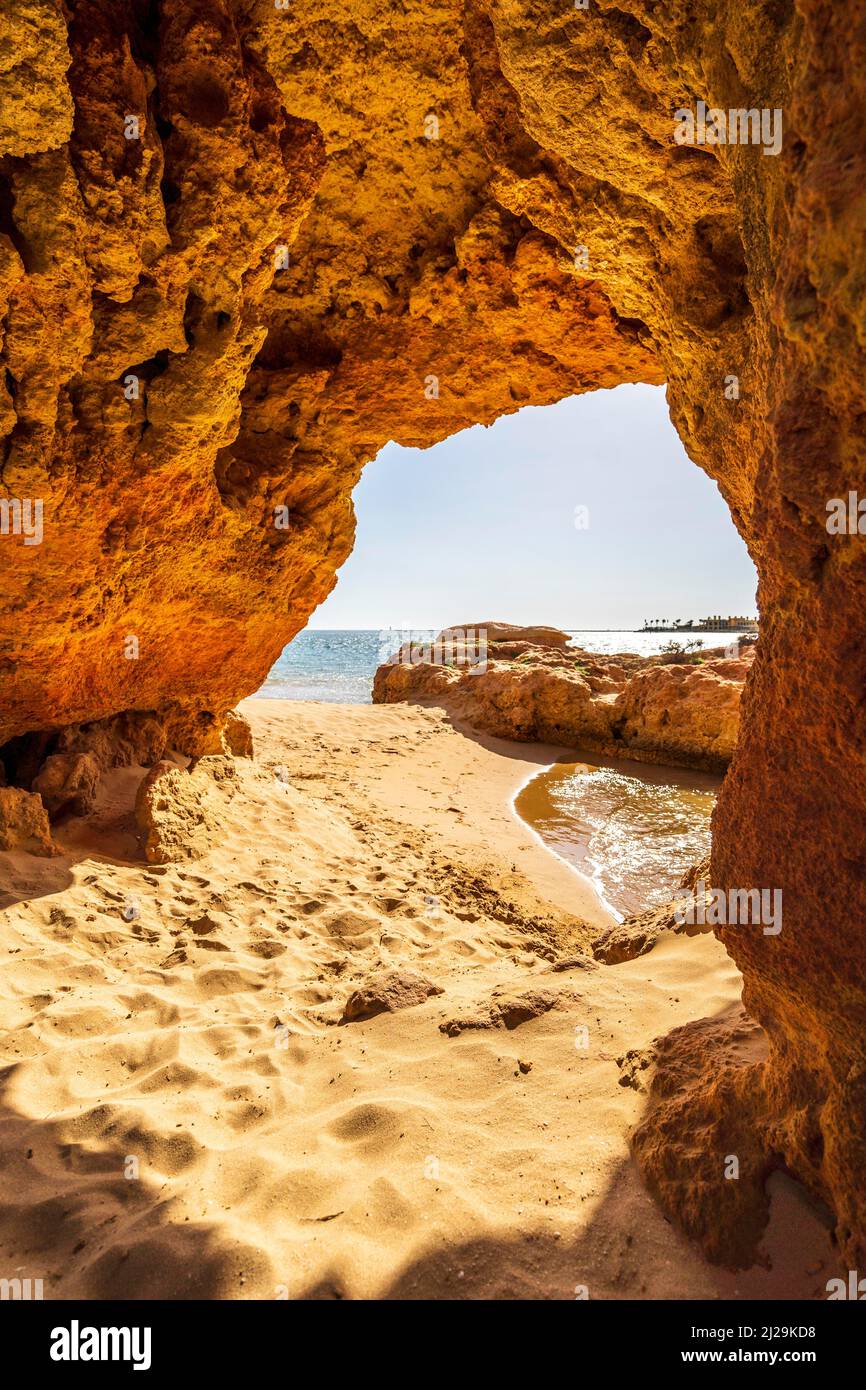 Beautiful sandstone arch with the view on marina in Portimao, Ferragudo, Algarve, Portugal Stock Photo